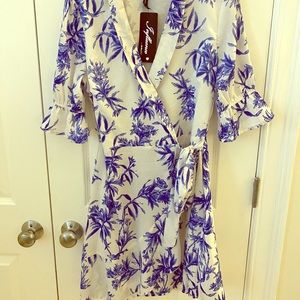 White floral mini wrap dress. NWT!